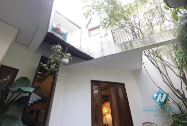 A nice house with unique style for rent on Vinh Tuy street 