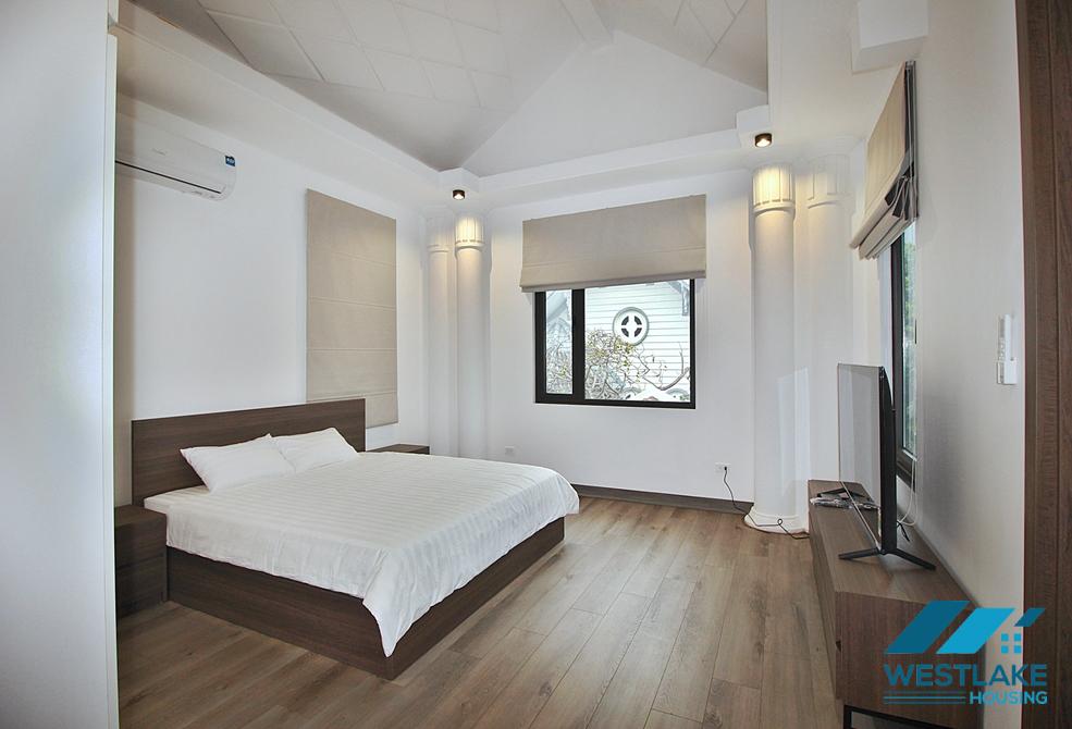 A pretty 4 bedrooms house with huge yard for rent in To Ngoc Van, Tay Ho