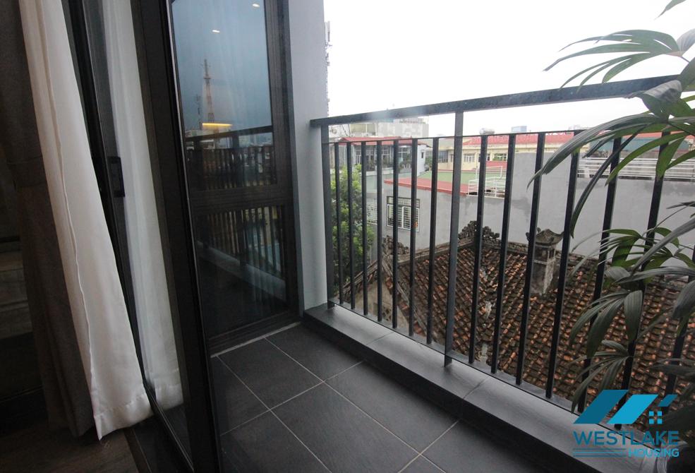 A high-end one bedroom apartment for rent is located on Bich Cau street,  Dong Da District