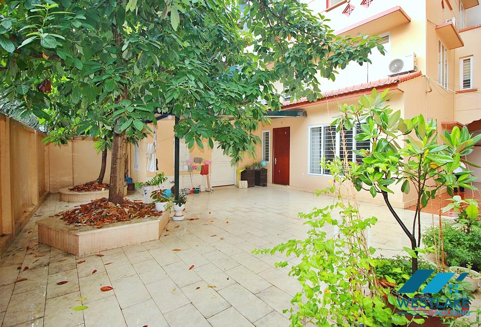 Unfurnished garden 4 bedrooms house for rent in Dang Thai Mai, Tay Ho, Ha Noi