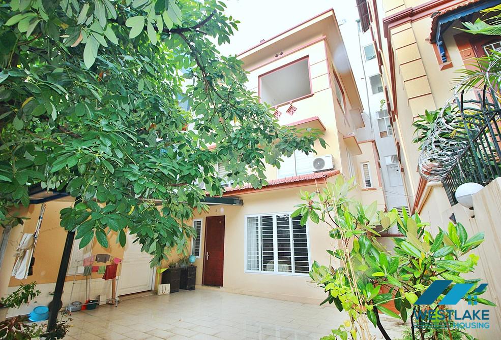 Unfurnished garden 4 bedrooms house for rent in Dang Thai Mai, Tay Ho, Ha Noi
