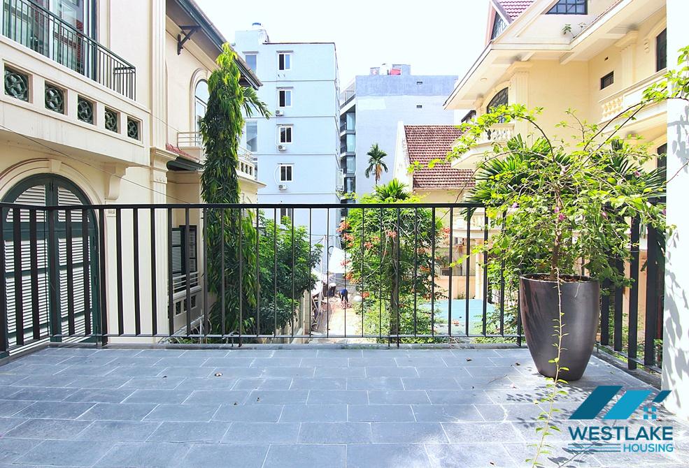 Spacious 4-bedroom apartment with a balcony on Tay Ho street, Tay Ho ward, Ha Noi for rent