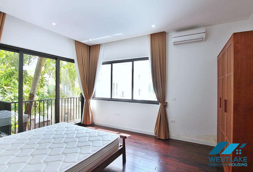 Spacious 4-bedroom apartment with a balcony on Tay Ho street, Tay Ho ward, Ha Noi for rent