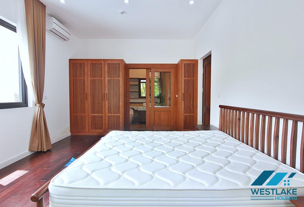 Spacious 4-bedroom apartment with a balcony on Tay Ho street, Tay Ho ward, Ha Noi for rent