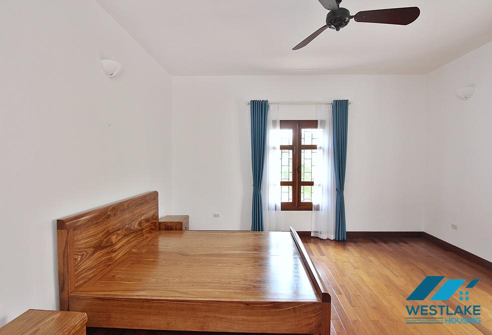 Lovely 04 bedrooms house with big yard for rent in To ngoc Van, Tay Ho, Ha Noi