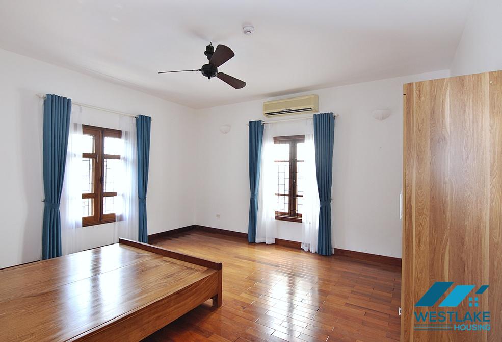 Lovely 04 bedrooms house with big yard for rent in To ngoc Van, Tay Ho, Ha Noi