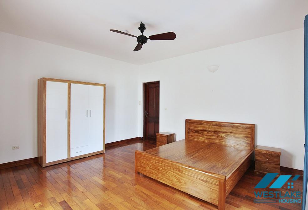 Lovely 04 bedrooms house with big yard for rent in To ngoc Van, Tay Ho, Ha Noi