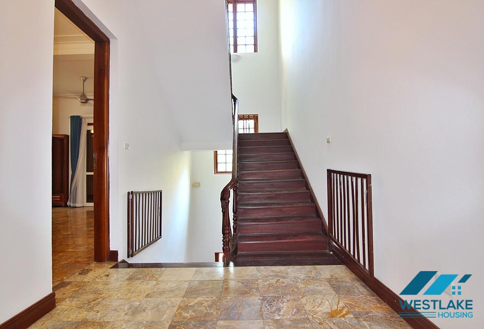 Lovely 04 bedrooms house with big yard for rent in To ngoc Van, Tay Ho, Ha Noi