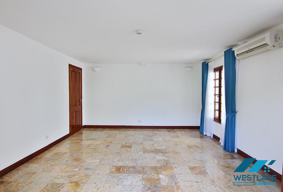 Lovely 04 bedrooms house with big yard for rent in To ngoc Van, Tay Ho, Ha Noi