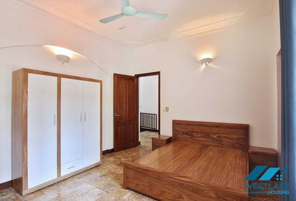 Lovely 04 bedrooms house with big yard for rent in To ngoc Van, Tay Ho, Ha Noi