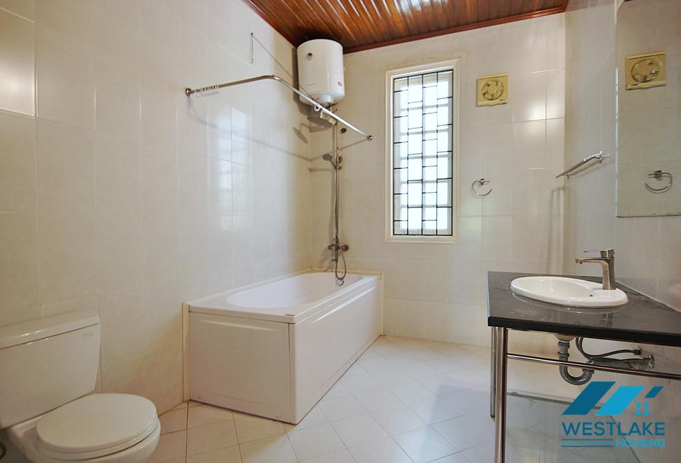 Lovely 04 bedrooms house with big yard for rent in To ngoc Van, Tay Ho, Ha Noi