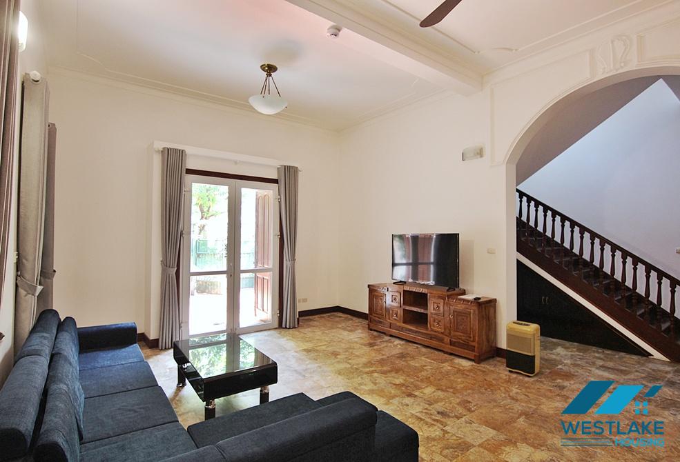 Lovely 04 bedrooms house with big yard for rent in To ngoc Van, Tay Ho, Ha Noi