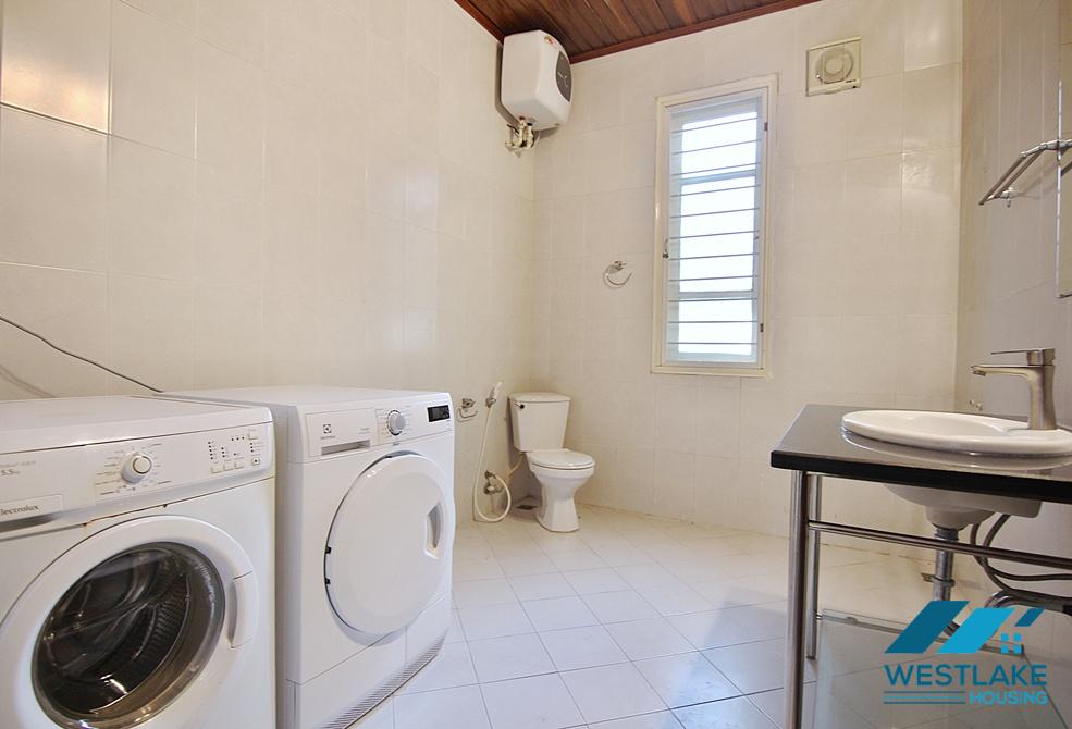 Lovely 04 bedrooms house with big yard for rent in To ngoc Van, Tay Ho, Ha Noi