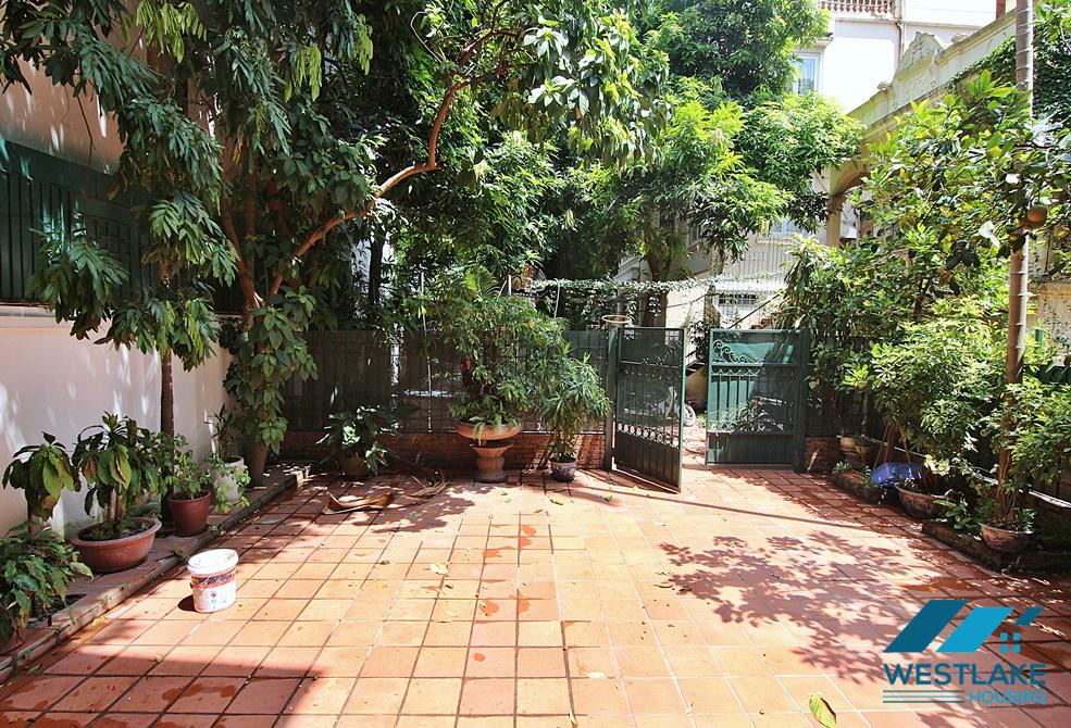 Lovely 04 bedrooms house with big yard for rent in To ngoc Van, Tay Ho, Ha Noi