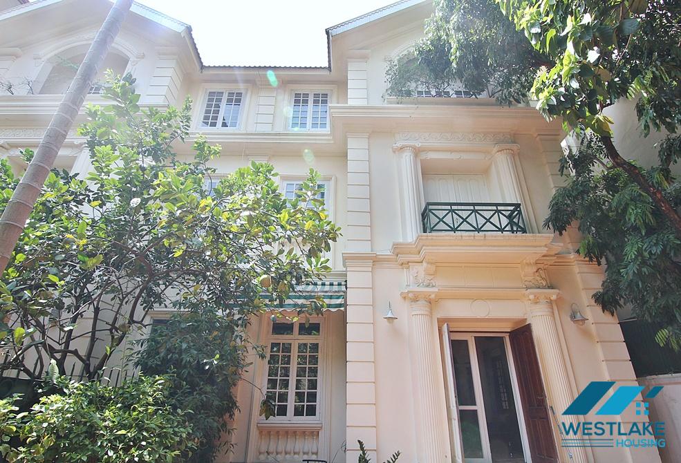 Lovely 04 bedrooms house with big yard for rent in To ngoc Van, Tay Ho, Ha Noi