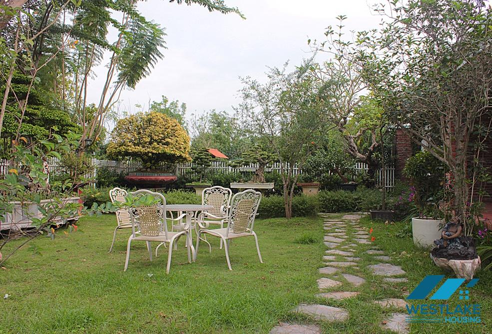 A house with big garden for rent in An Duong, Tay Ho, Ha Noi