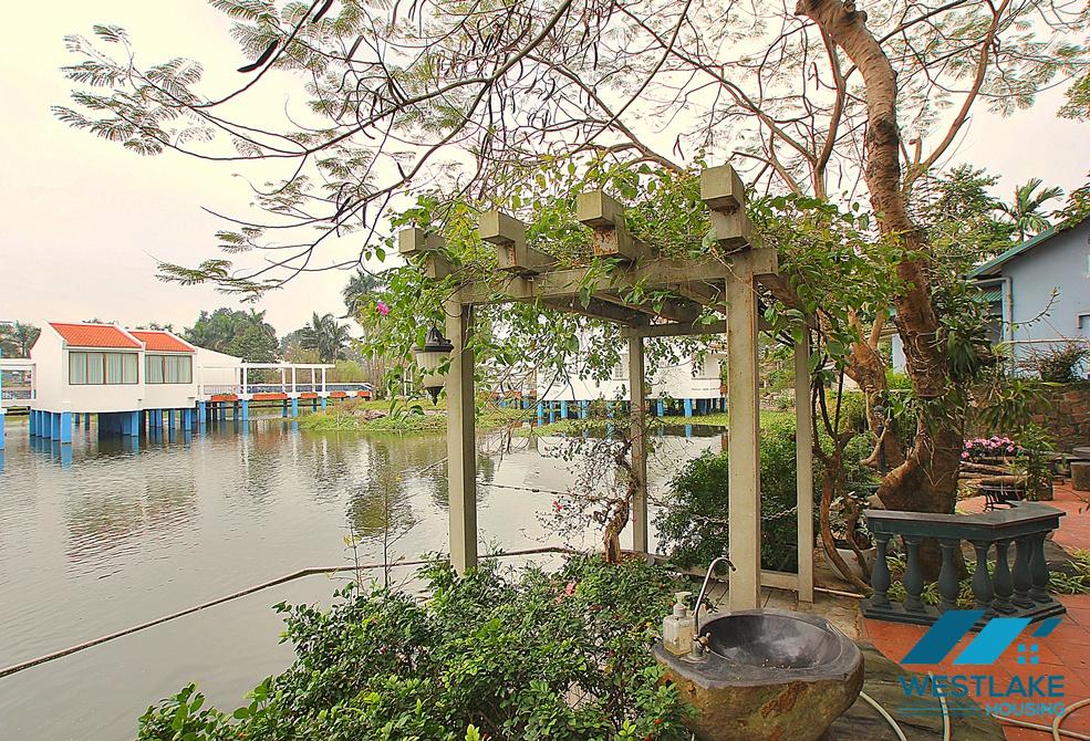 Beautiful house with large yard and lake view available for rent in Westlake area, Tay Ho, Ha Noi