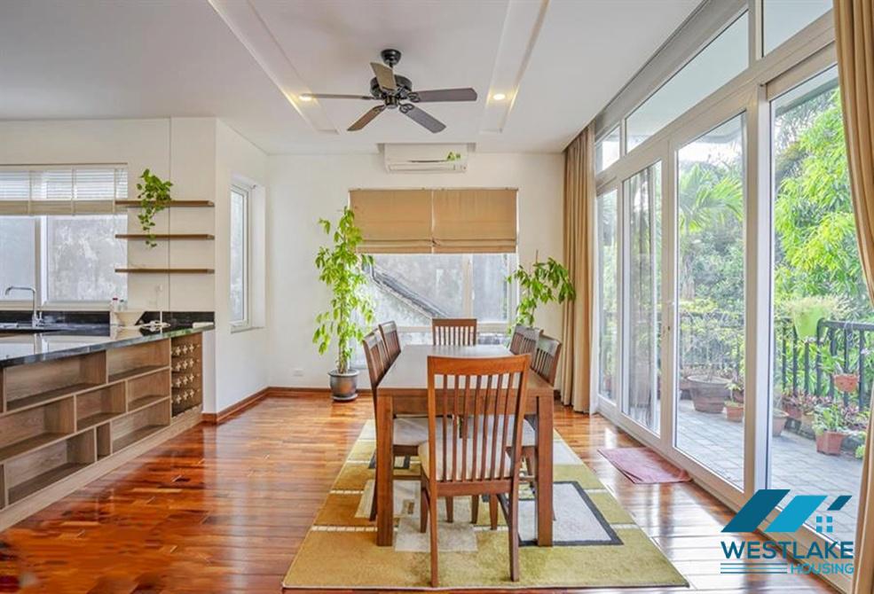 A green and airy four bedrooms apartment for rent in Au Co street, Tay Ho, Ha Noi