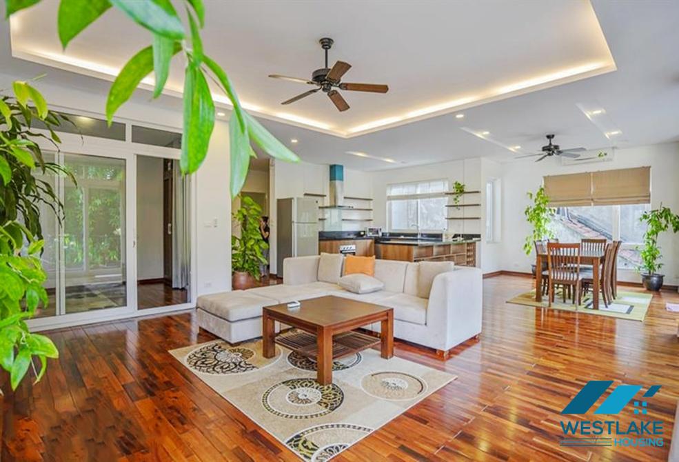 A green and airy four bedrooms apartment for rent in Au Co street, Tay Ho, Ha Noi