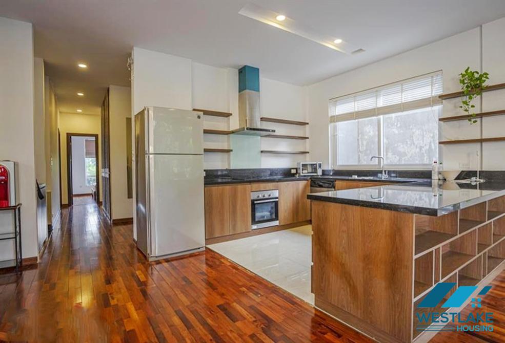 A green and airy four bedrooms apartment for rent in Au Co street, Tay Ho, Ha Noi