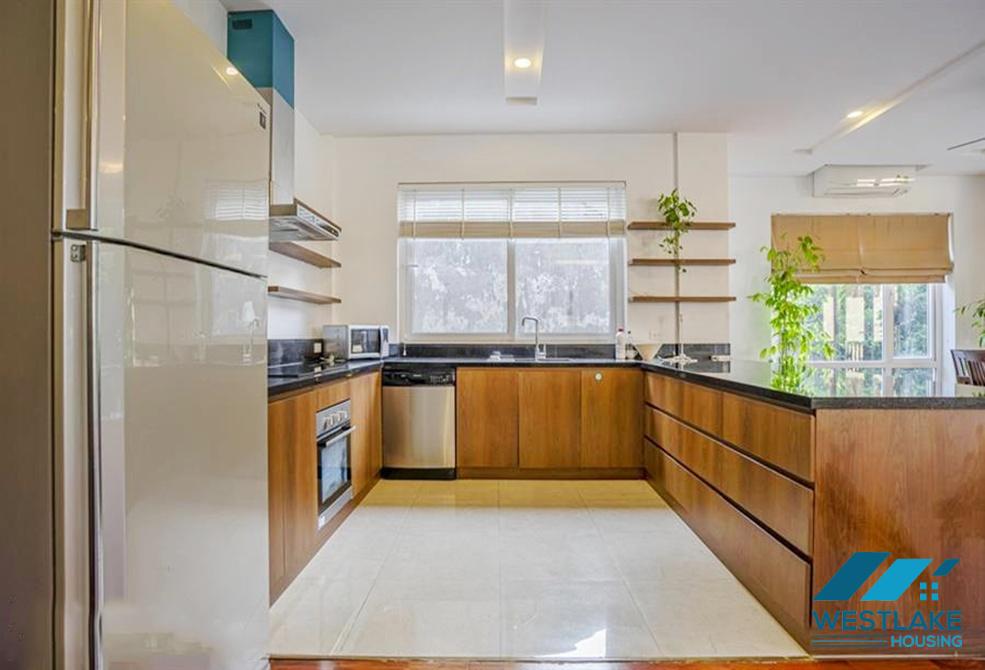 A green and airy four bedrooms apartment for rent in Au Co street, Tay Ho, Ha Noi