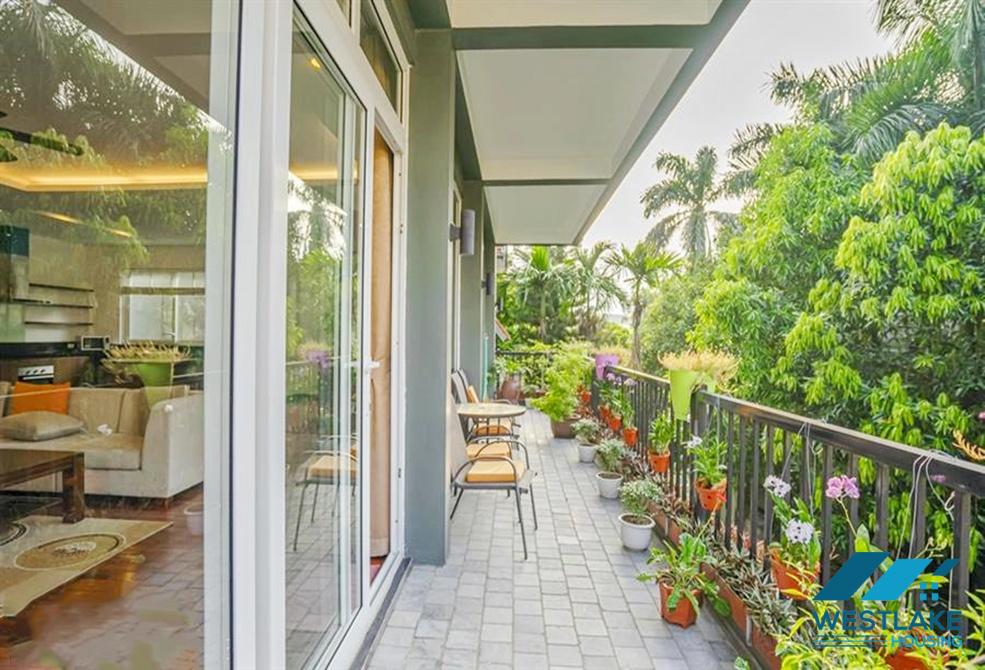 A green and airy four bedrooms apartment for rent in Au Co street, Tay Ho, Ha Noi