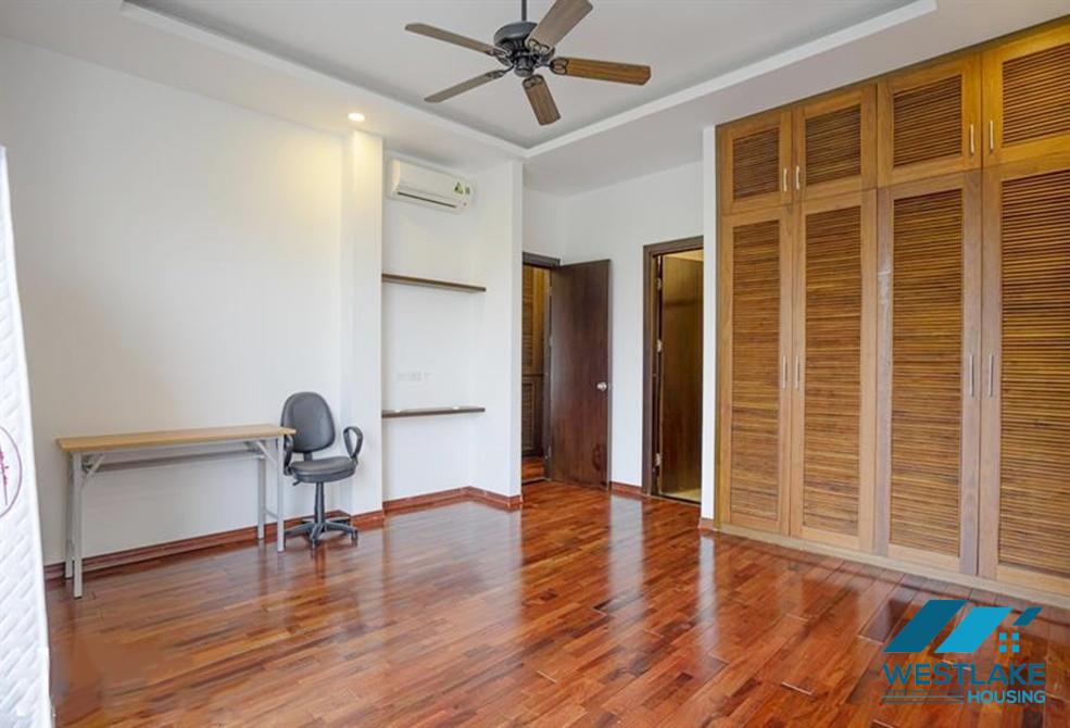 A green and airy four bedrooms apartment for rent in Au Co street, Tay Ho, Ha Noi