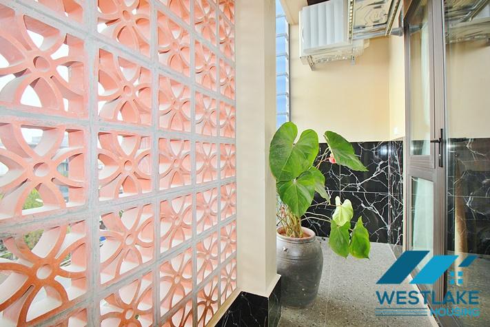 Newly and modern 2-bedroom apartment with a spacious balcony for rent in Yen Phu, Tay Ho, Hanoi.
