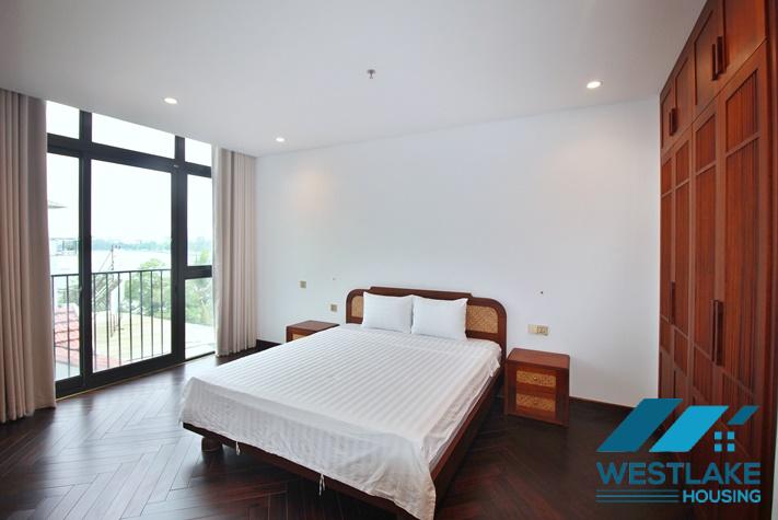 Beautiful, spacious 4-bedroom apartment with a large balcony and lake view for rent in Tu Hoa, Tay Ho, Hanoi.