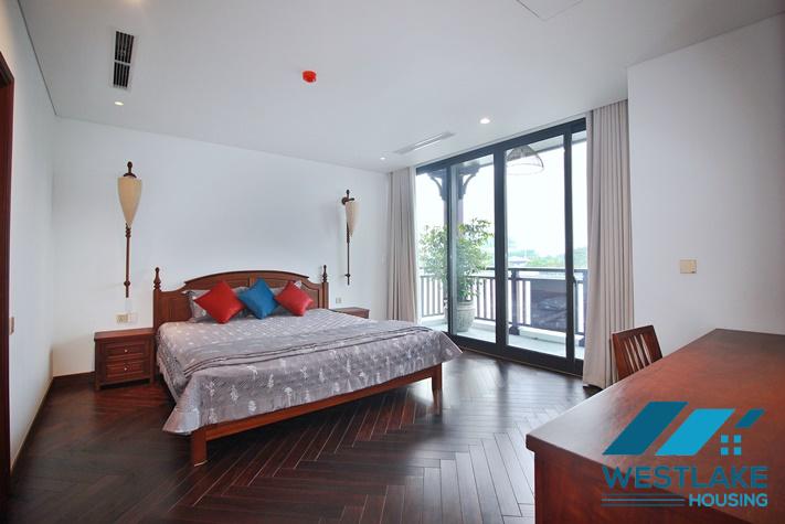 Beautiful, spacious 4-bedroom apartment with a large balcony and lake view for rent in Tu Hoa, Tay Ho, Hanoi.