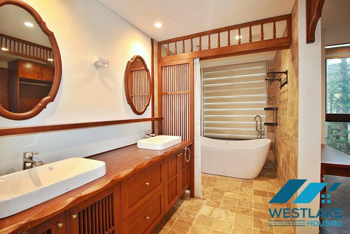 Brand new, modern 4-bedroom apartment for rent with a large balcony overlooking the lake in Tu Hoa, Tay Ho, Hanoi.