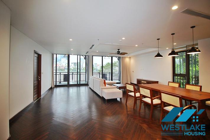 Brand new, modern 4-bedroom apartment for rent with a large balcony overlooking the lake in Tu Hoa, Tay Ho, Hanoi.