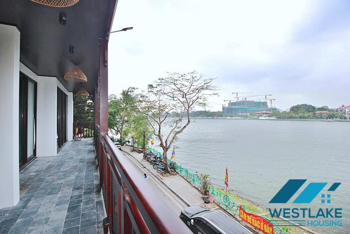 Brand new, modern 4-bedroom apartment for rent with a large balcony overlooking the lake in Tu Hoa, Tay Ho, Hanoi.